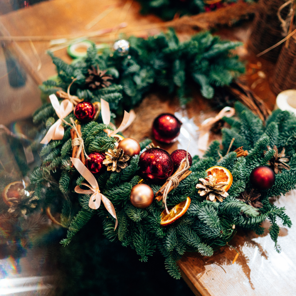 Christmas wreath laying on a table